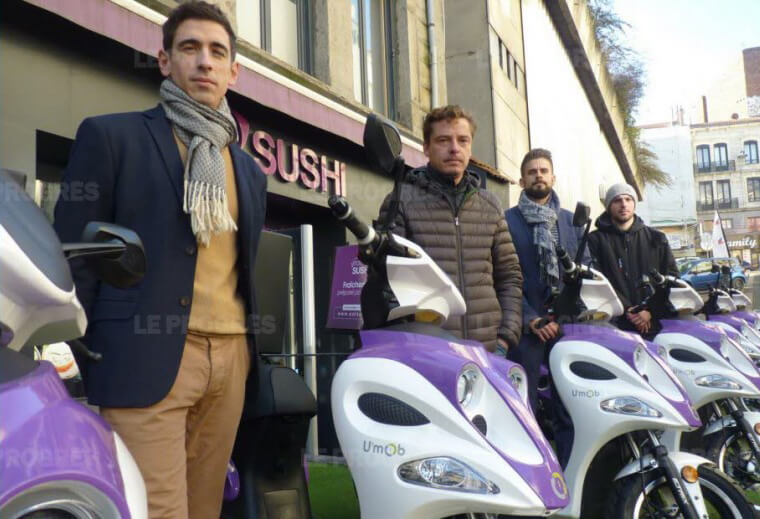 Equipe U'MOB avec scooter électrique Eat Sushi